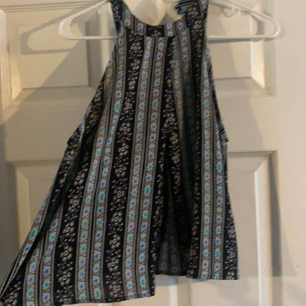 Sleeveless flowered shirt